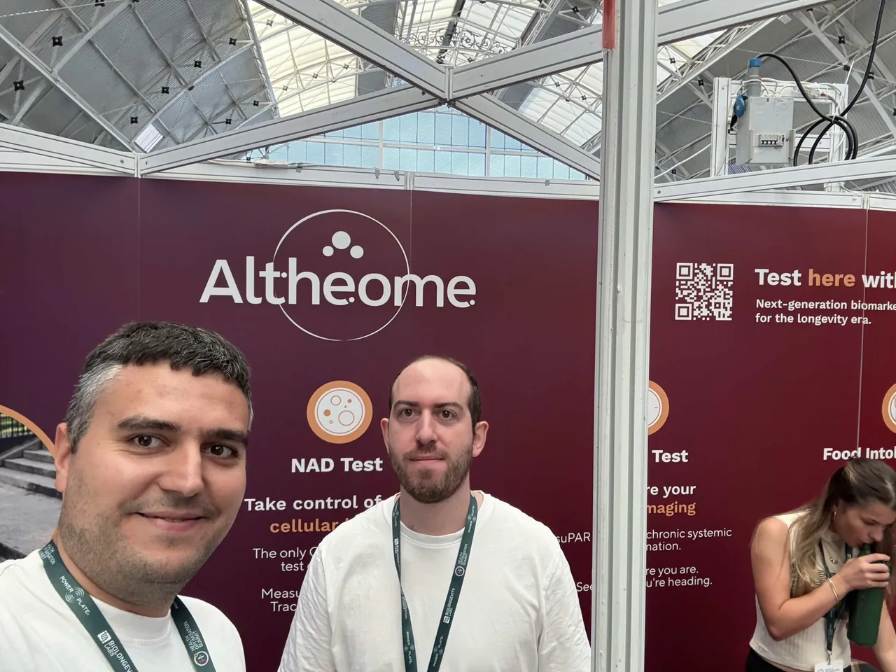 Two xHeal team members at the Altheome stand